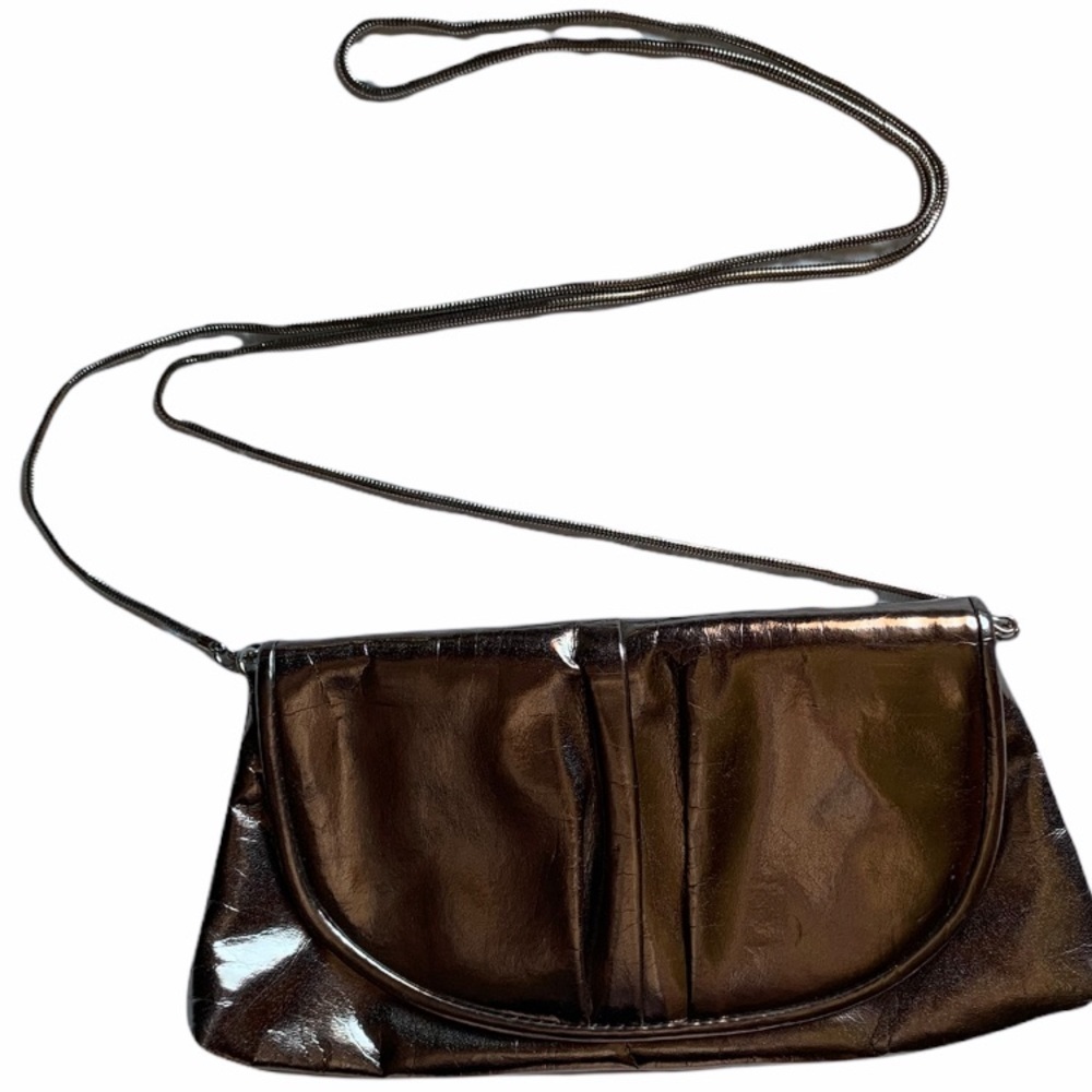 La Regale silver baguette purse with chain and snap closure